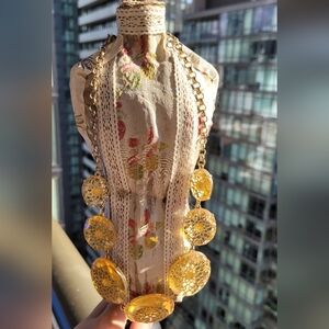 Filigree goldtone and golden yellow acrylic statement necklace